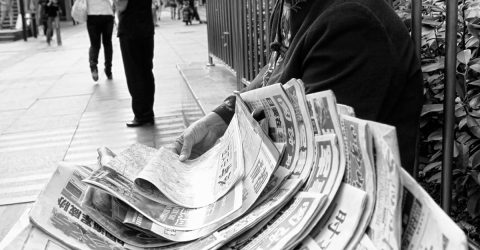 Newspapers lady