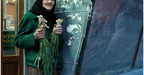 The old lady who sells green onions and garlic.