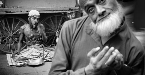 A leprous man and a beggar. Nizamuddin West, Delhi, 2018.