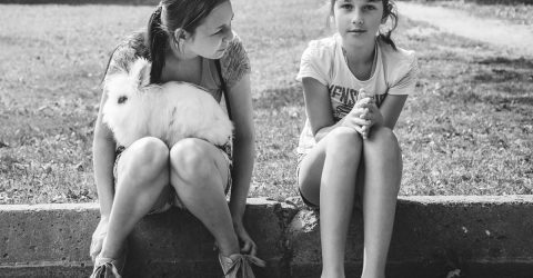 Two girls with a rabbit