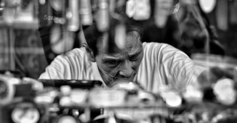 Looking through the booth of a watchmaker.