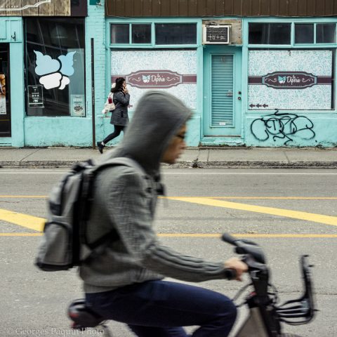 Cyclist and a girl in the background