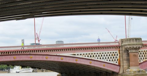 Police Officer on a Bridge