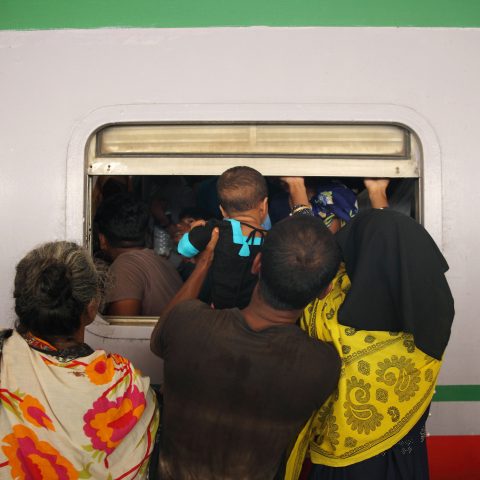 Passengers riding trains through the window for challenging journey-02