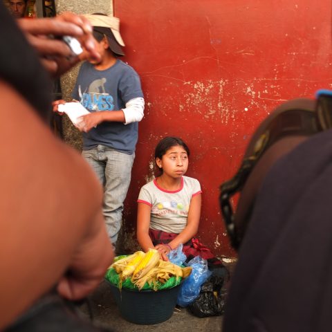 Girl selling corn