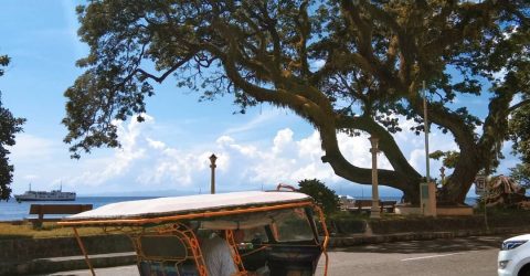 Tricycle on the beachfront of Dumaguete, Philippines