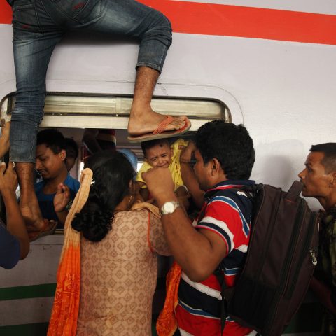 Passengers riding trains through the window for challenging journey-07