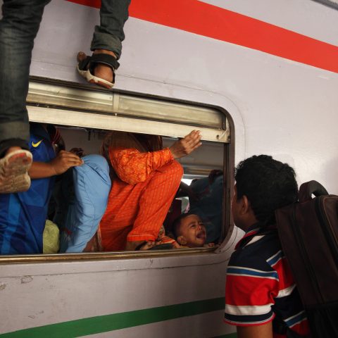 Passengers riding trains through the window for challenging journey-09