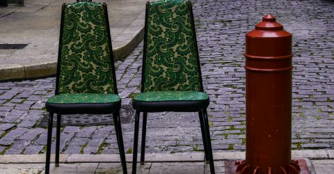 Two chairs and a pole