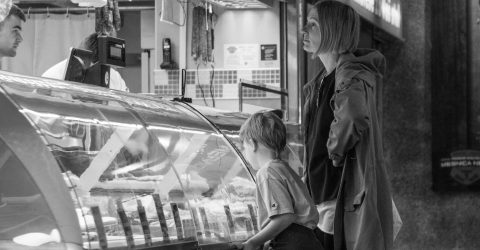 Mother and son in the market