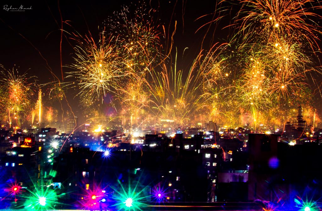 celebrating new year in street fire works - Exibart Street