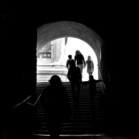 Family on the steps in the tunnel