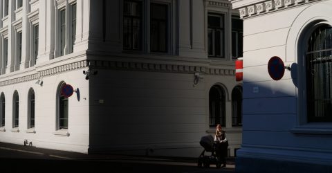 Woman with a tram on Victoria Terasse