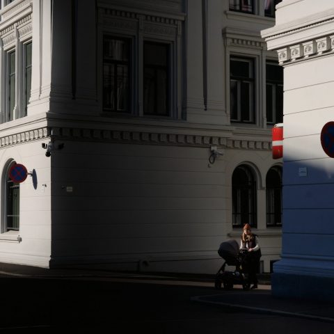 Woman with a tram on Victoria Terasse